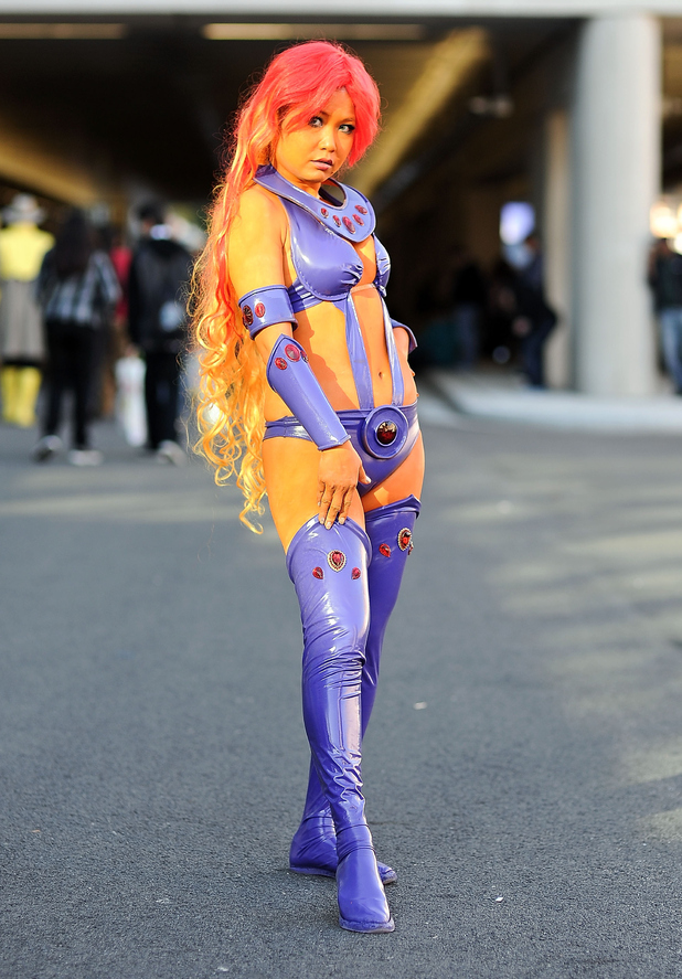 NEW YORK, NY - OCTOBER 12: A Comic Con attendee poses as Starfire during the 2014 New York Comic Con at Jacob Javitz Center on October 12, 2014 in New York City. (Photo by Daniel Zuchnik/Getty Images)